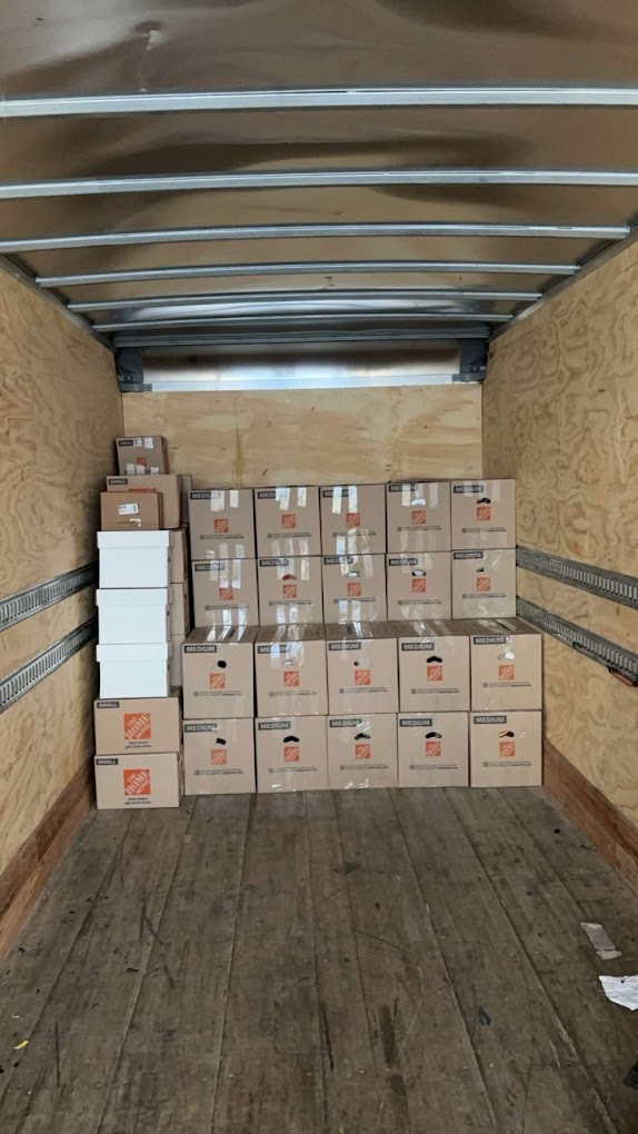 Your Local Moverz team securing items in moving truck